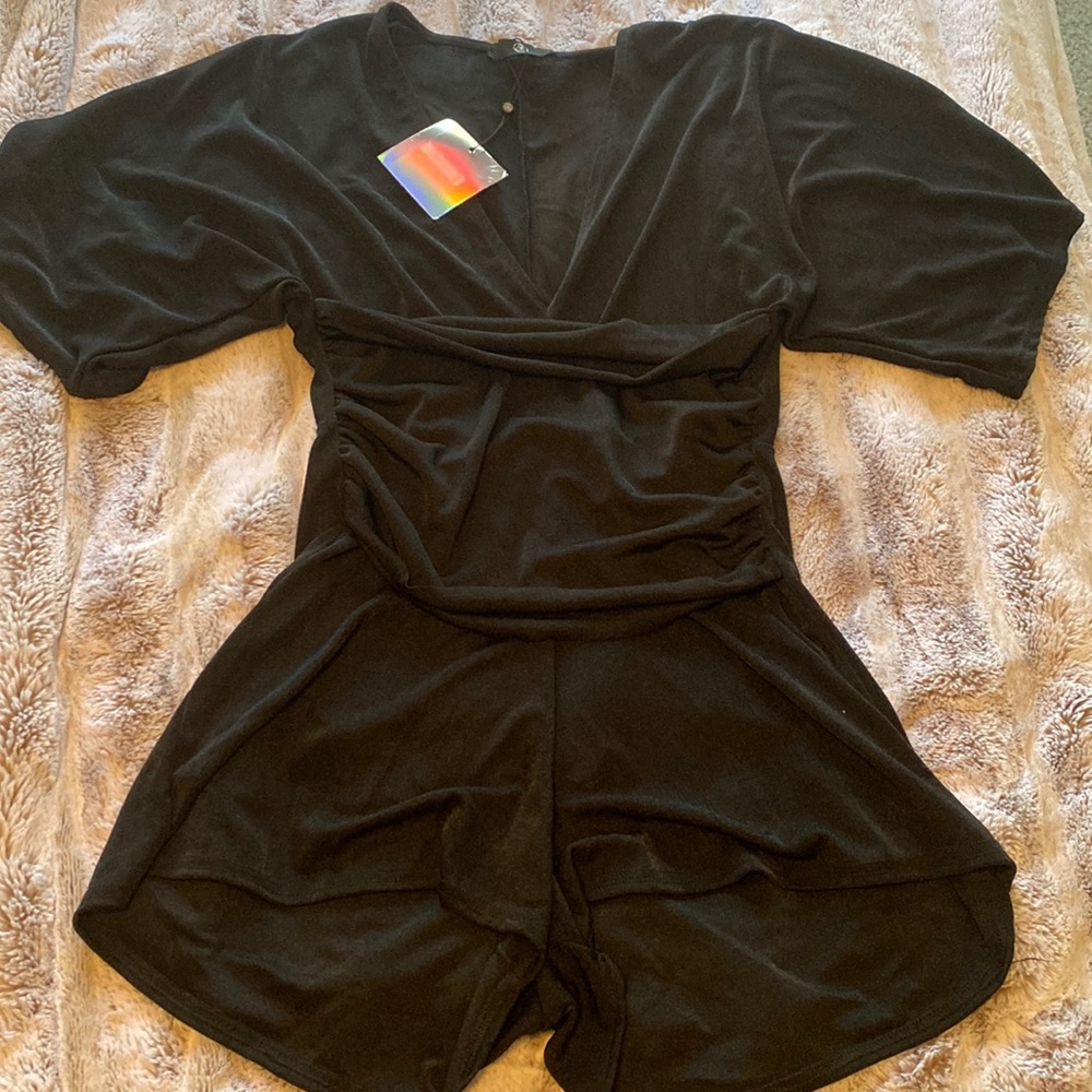 Brand new black playsuit from Missguided